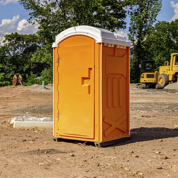 what is the cost difference between standard and deluxe portable restroom rentals in Harrietstown New York